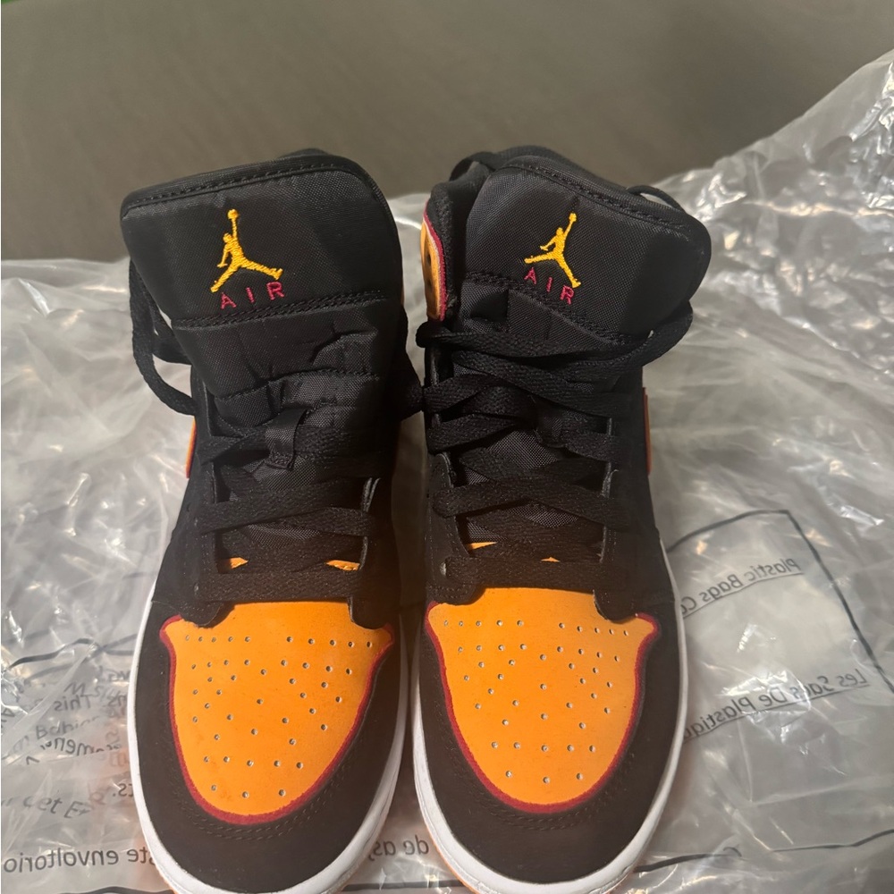 Jordan Air 1 High Black and Orange Sneakers